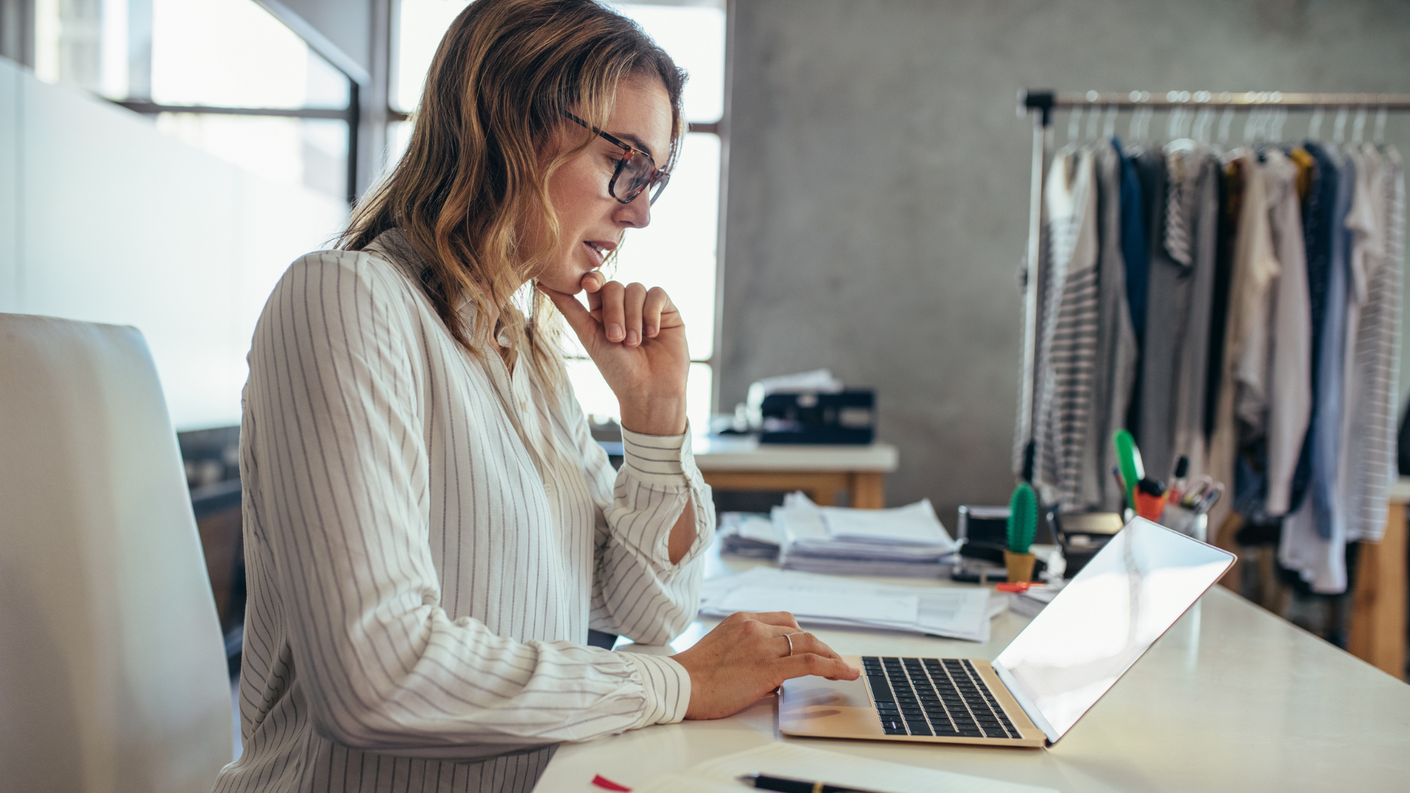 Person reviewing IRS tax debt relief options, including Currently Not Collectible status